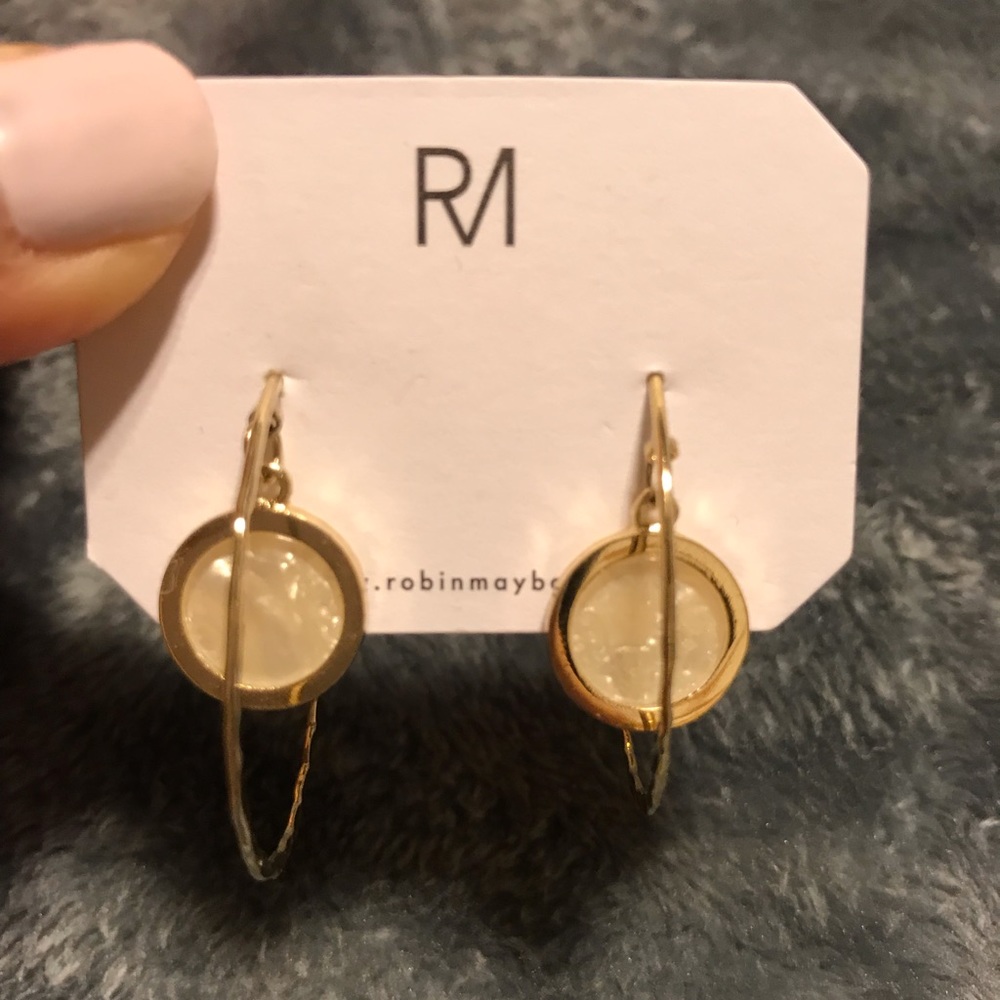 Gold hoop earrings with white marble pendant
